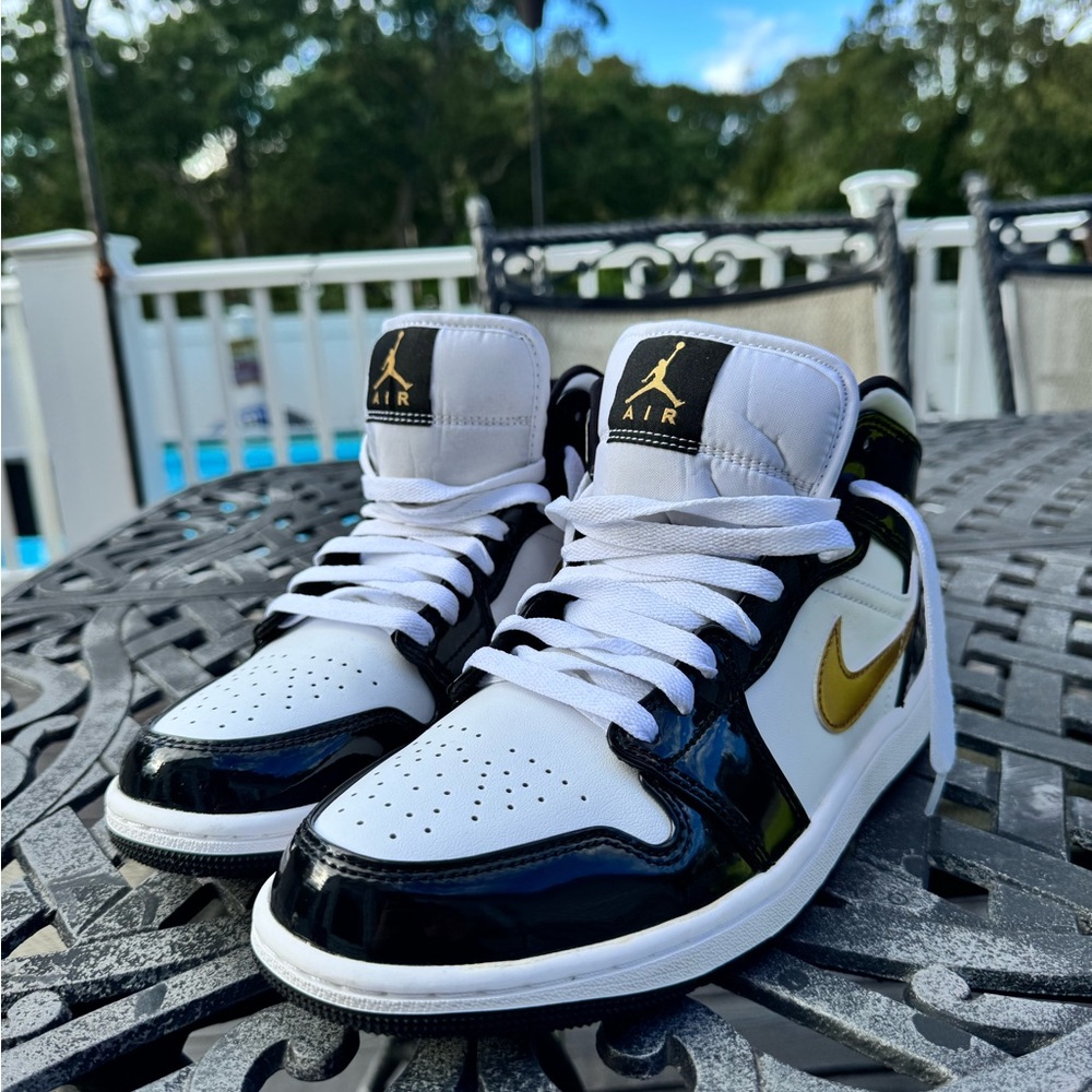 Nike Air Jordan White and Gold Sneakers